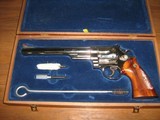 SMITH & WESSON MODEL 29-2
8 3/8 NICKEL PLATED 44 MAGNUM - 1 of 2