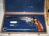 SMITH & WESSON MODEL 29-2
8 3/8 NICKEL PLATED 44 MAGNUM - 2 of 2