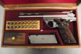AUTO MAG .44 AMP, MADE BY TDE NORTH HOLLYWOOD, CA WITH ORIGINAL HIGH STANDARD PRESENTATION BOX, NEAR NEW CONDITION - 1 of 6
