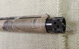 Remington 870 Super Mag 12 gauge Pump Shotgun in Real-tree Camo - 5 of 10