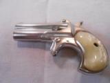  Remington Double Derringer
"DOUBLE ACE" .41 Rim fire Nickle Plated Pearl Grips - 4 of 14