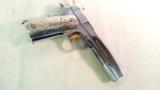 COLT MODEL OF 1911 ARMY NICKEL/GOLD
PLATED WITH AZTEC
MOTIF
GOLD PLATED GRIPS - 2 of 13
