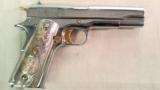 COLT MODEL OF 1911 ARMY NICKEL/GOLD
PLATED WITH AZTEC
MOTIF
GOLD PLATED GRIPS - 1 of 13