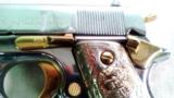 COLT MODEL OF 1911 ARMY NICKEL/GOLD
PLATED WITH AZTEC
MOTIF
GOLD PLATED GRIPS - 6 of 13