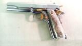 COLT MODEL OF 1911 ARMY NICKEL/GOLD
PLATED WITH AZTEC
MOTIF
GOLD PLATED GRIPS - 3 of 13