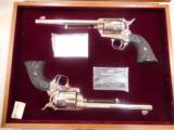 CASED PAIR OF 100TH ANNIVERSARY COLT FRONTIER SIX SHOOTERS IN .44WCF - 1 of 15