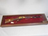 Winchester
SESQUICENTENNIAL Model 94 Lever Action 38-55 Carbine with Wooden Display Case - 1 of 15