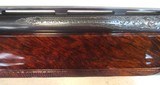 Signed Factory Engraved and Gold Inlaid Remington Model 1100SF Premier Grade Semi-Automatic Shotgun in 12 Gauge - 12 of 14