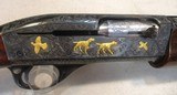 Extraordinary Model 1100SF Premier Grade Signed Master Engraved Semi-Automatic Shotgun in 12 Gauge Gold
Inlaid - 5 of 14