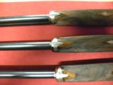 Fabbri Set of three Torcoli
Engraved Custom O/U Detachable Pinless Sidelock in 12-Gauge
- 11 of 11