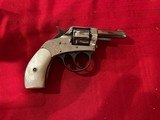 H&R Young American DA 22
7 shot Revolver - 1 of 6