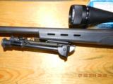 Remington 700 sps Varmit 22-250 and
8X32 scope & Bi-pod - 12 of 13