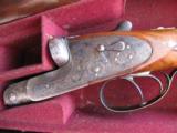 COGSWELL & HARRISON LTD.
A PAIR OF 12-BORE ‘EXTRA QUALITY VICTOR' HAND-DETACHABLE SIDELOCK EJECTORS. - 2 of 6