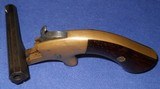 * Antique 1860s H.C. LOMBARD SPRINGFIELD, MA
DERRINGER SIDE SWING .22 rf - 12 of 15