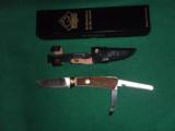 Puma Jager Fixed Blade Knife New in Box - Stag scales - bronze bolsters - saw and gut blades fold in handle - 1 of 2