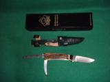 Puma Jager Fixed Blade Knife New in Box - Stag scales - bronze bolsters - saw and gut blades fold in handle - 2 of 2