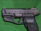 Ruger - SR9C w/Laser, 9mm. 3.5