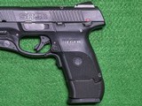 Ruger - SR9C w/Laser, 9mm. 3.5