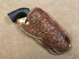 Extremely Nice Colt SAA (Bisley Model) Revolver with Outstanding Rare Vintage Carved Holster!
- 15 of 15
