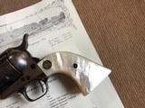 *RARE GUTHRIE OKLAHOMA* Colt SAA Revolver!
.45cal. 4 3/4" Barrel Blue Finish w/ Factory Pearl Stocks and Factory Letter* - 10 of 14