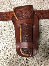 H.H.Heiser stamped Floral Tooled Cartridge Belt and Holster