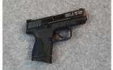 Smith & Wesson M & P 40C--.40 S&W - 1 of 2