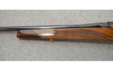 Weatherby 1984 Olympic Mark V
7mm Weatherby Mag - 6 of 9