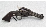 Ruger ~ New Vaquero Conv ~ .357 Magnum/9 mm - 1 of 3