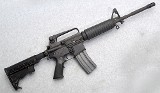 Bushmaster ~ XM15-E2S ~ 5.56 NATO - Image 1 of 10