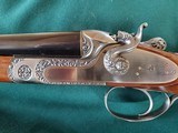 Classy Pedretti Engraved Famars - Abbiattico & Salvinelli Self Cocking "Castore"
Model 28 Bore Shotgun with Case