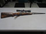 Dakota Arms Model 10 DLX 22-250 Remington w/ Leupold VX-3 4.5-14x40mm Scope - 1 of 15