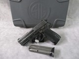 Sig Sauer SP2022 9mm SIGLITE Night Sights 3.9” 15+1 New in Box - 1 of 15