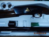 NIB Remington 1100 Sam Walton Commemorative High-Grade with Gold Inlay - All 3 Gauges - 12, 20, 28, with Matching Serial Numbers - 3 of 15