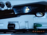NIB Remington 1100 Sam Walton Commemorative High-Grade with Gold Inlay - All 3 Gauges - 12, 20, 28, with Matching Serial Numbers - 11 of 15