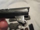 1918 M1911 USGI Pistol w/Heart Shape Grip Frame.
Parkerized/Rework w/o Arsenal Stampings.
Excellent Condition/Function - 9 of 15