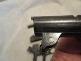 1918 M1911 USGI Pistol w/Heart Shape Grip Frame.
Parkerized/Rework w/o Arsenal Stampings.
Excellent Condition/Function - 10 of 15