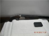 Mossberg Silver Reserve 11 Field 12 Ga. - 1 of 12