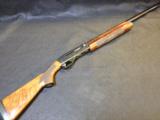 REMINGTON 1100 SPORTING- 28GA - 1 of 4