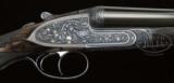 Amazing J Purdey & Sons 12-bore Heavy Game Gun with Chiselled American Game Bird Engraving 2 Barrel Sets and Case - 1 of 8