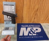 S&W Embossed Signage & Counter Mat For Introduction Of The M&P Pistol Series - 6 of 6