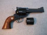 Ruger New Model Blackhawk 357 Mag Revolver With 9mm Conversion Cylinder
- 1 of 15