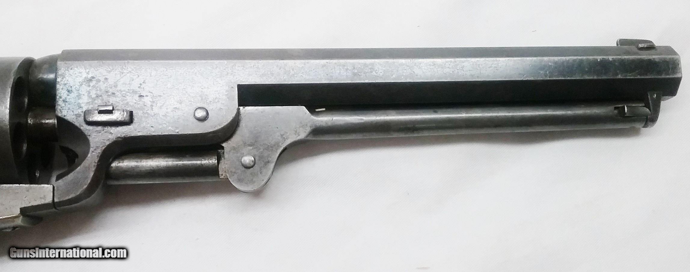 Colt Mod. 1851 Navy,engraved,silver plating,cased,postwar,cal..36,no.  16337. Matching numbers. Octagonal barrel,bright bore,length 7-1/2. Six  shots. Manufactured in 1975. Firm address on barrel,on frame marked Colts  Patent. On cylinder roll