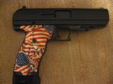 High point 45acp semi auto pistol with patriotic grips - 1 of 3