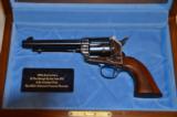 USFA REPLICATION OF TEDDY ROOSEVELT GUN IN THE NATIONAL FIREARMS MUSEUM - 1 of 3