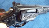 VINTAGE FULLY
ENGRAVED SMITH & WESSON 38/44 OUTDOORSMAN 1950 (PRE-MODEL 23) with IVORY GRIPS
6.5"BARREL 38 S&W SPECIAL
- 2 of 15