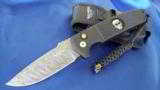 PROTECH DAMASCUS ROCKEYE AUTO KNIFE
BLACK wIth STERLING SKULL
(LIMITED #27 of 35) NEW IN THE BOX with SHEATH - 5 of 12