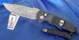 PROTECH DAMASCUS ROCKEYE AUTO KNIFE
BLACK wIth STERLING SKULL
(LIMITED #27 of 35) NEW IN THE BOX with SHEATH - 1 of 12