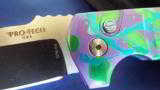 PROTECH
LES GEORGE ROCKEYE ~ STERLING SKULL~ PURPLE/GREEN/TEAL SPLASH ANODIZING ~ ONE OF A KIND!! AUTO KNIFE (NIB) - 5 of 7