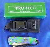 PROTECH
LES GEORGE ROCKEYE ~ STERLING SKULL~ PURPLE/GREEN/TEAL SPLASH ANODIZING ~ ONE OF A KIND!! AUTO KNIFE (NIB) - 3 of 7