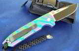 PROTECH
LES GEORGE ROCKEYE ~ STERLING SKULL~ PURPLE/GREEN/TEAL SPLASH ANODIZING ~ ONE OF A KIND!! AUTO KNIFE (NIB) - 2 of 7